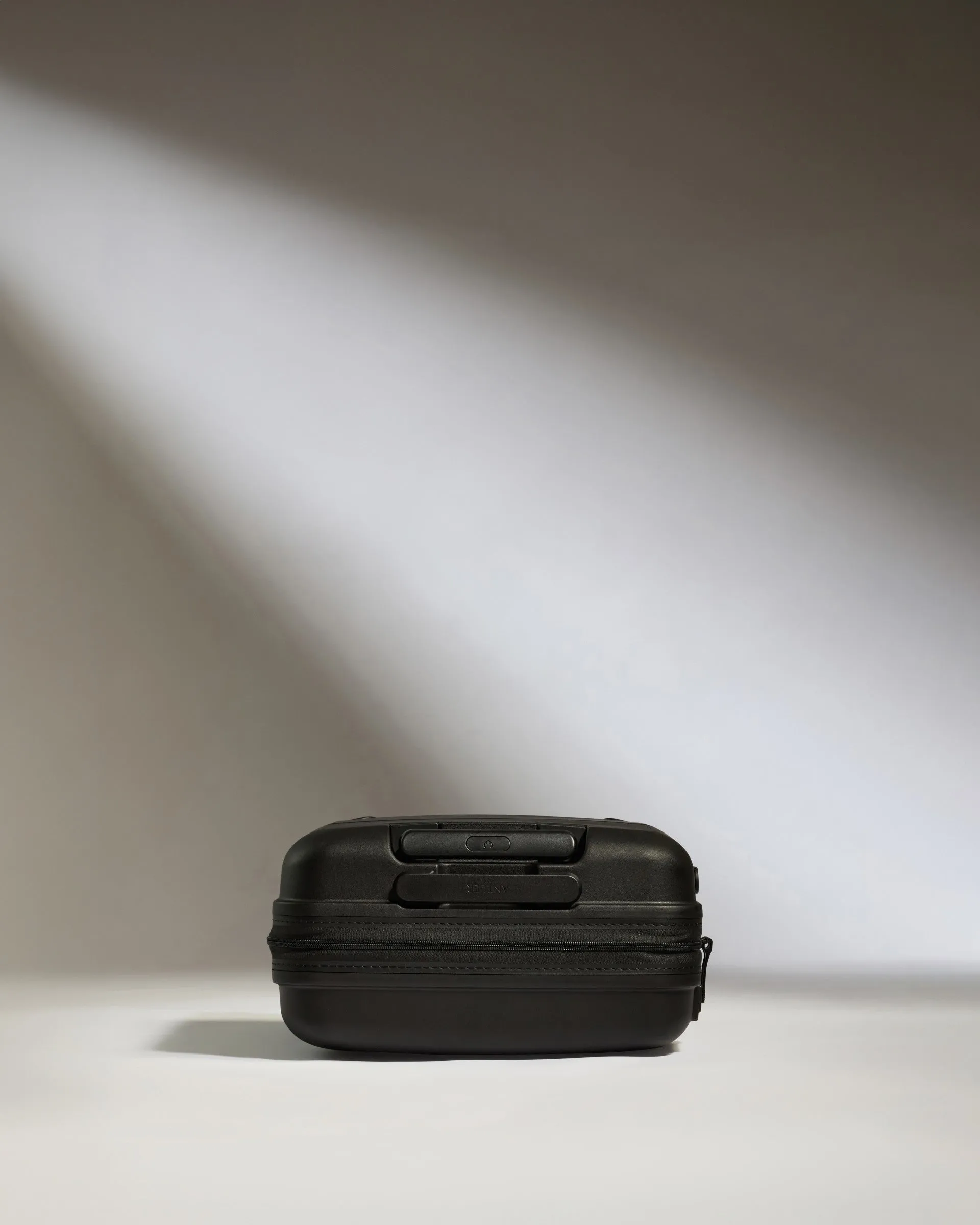 Cabin Suitcase in Black - Single Stripe