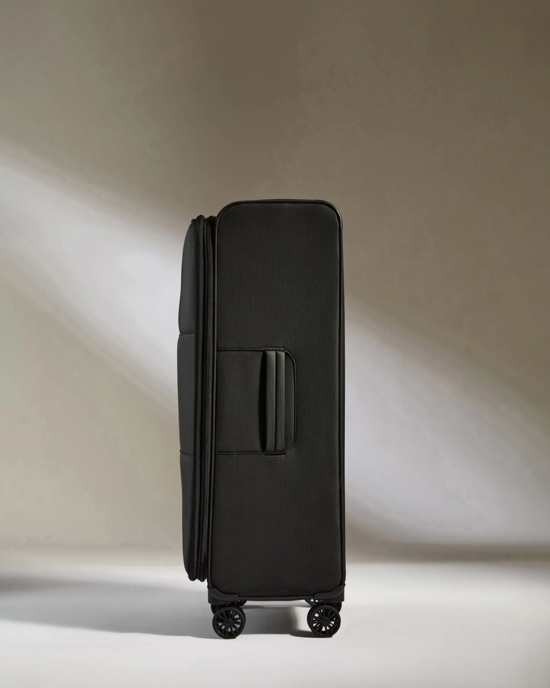 Lightest Large Suitcase in Black - Soft Stripe