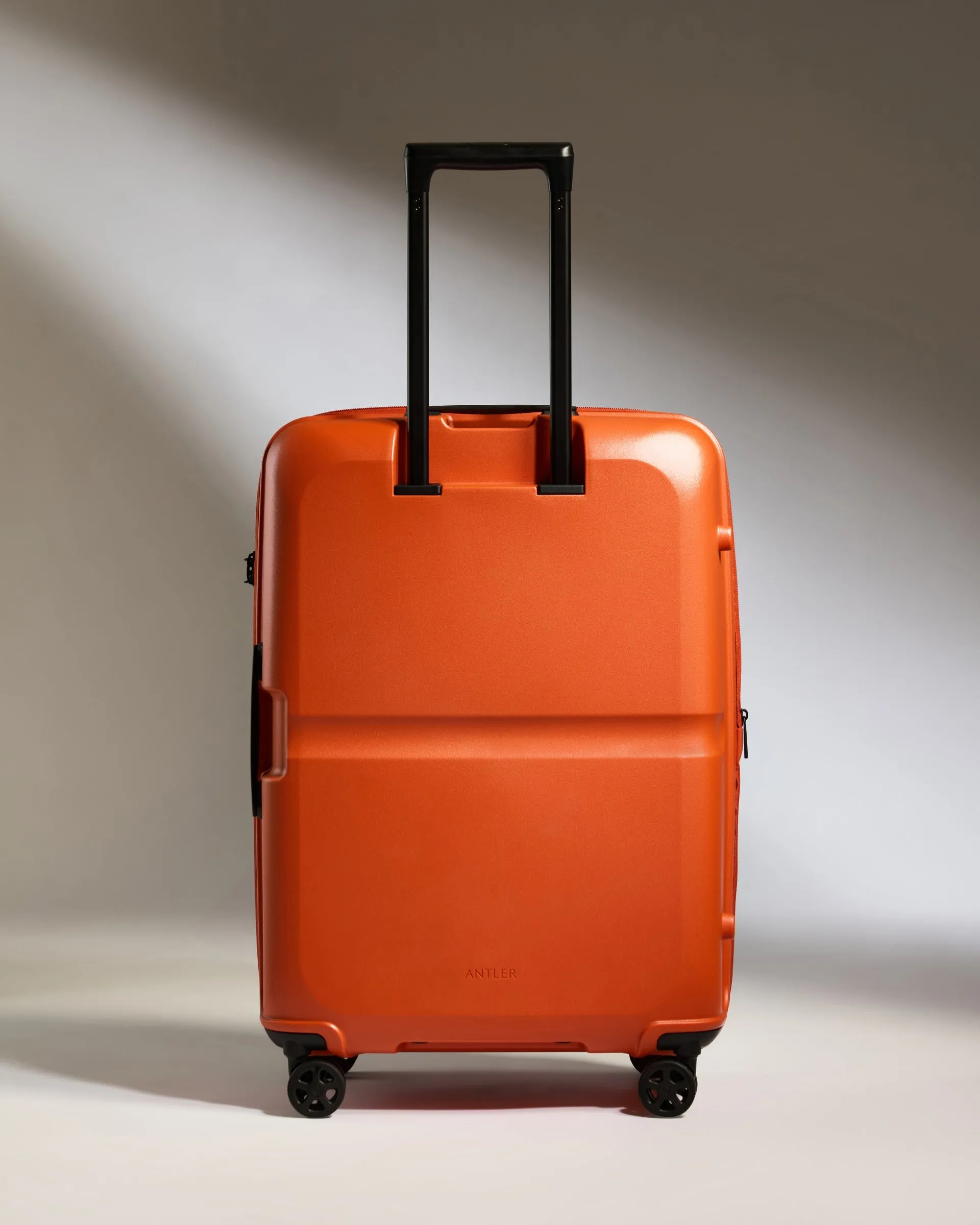 Medium Luggage in Ember Orange - Single Stripe