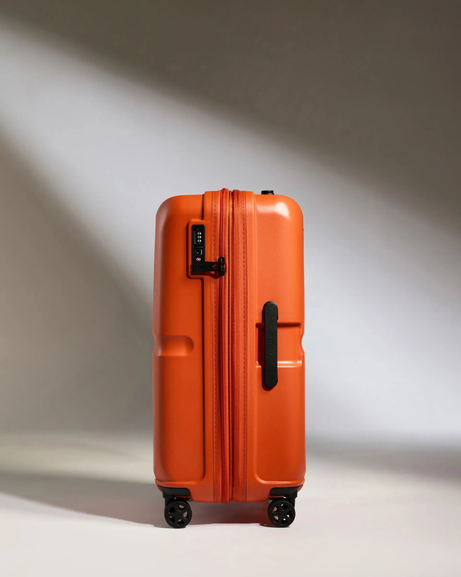 Medium Luggage in Ember Orange - Single Stripe